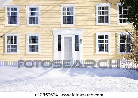 Yellow New England Home in Snow View Large Photo Image Picture - Yellow New England Home in Snow. Fotosearch