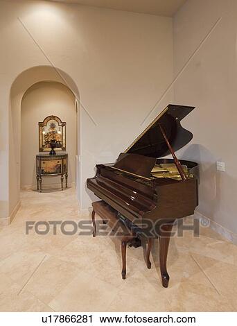 Baby grand piano in corner of luxury home View Large Photo Image Stock Image - Baby grand piano in corner of luxury home. Fotosearch