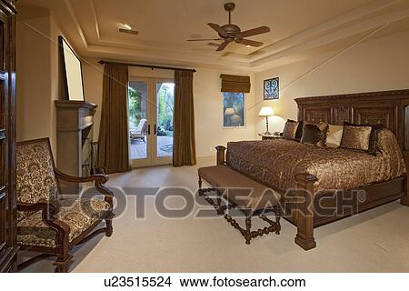 Picture - Bedroom in a luxury home. Fotosearch