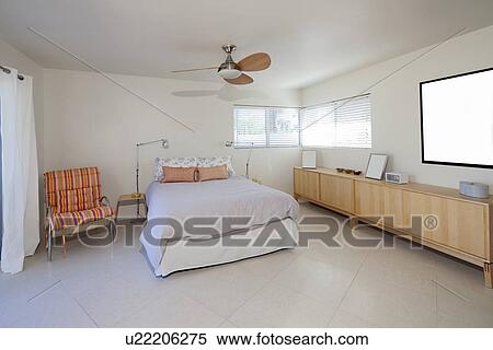 Bedroom interior with lots of natural light View Large Photo Image Stock Photography - Bedroom interior with lots of natural light. Fotosearch