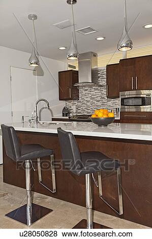 Breakfast bar in modern kitchen View Large Photo Image Stock Photo - Breakfast bar in modern kitchen. Fotosearch