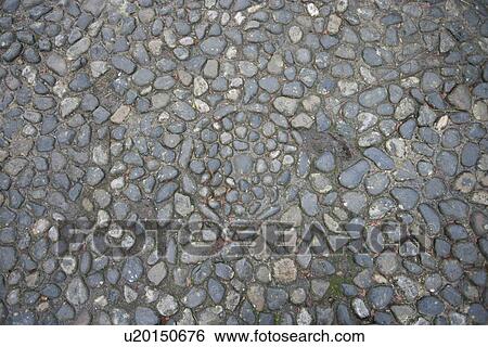 Stock Photograph - Circle pattern in stone path. Fotosearch