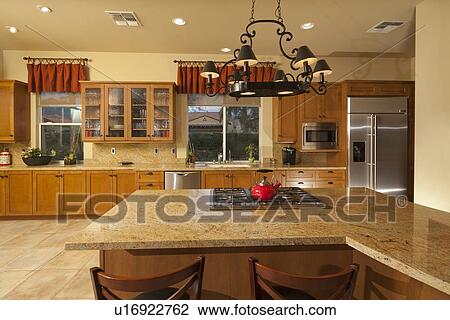 Stock Image - Combined kitchen dining space. Fotosearch