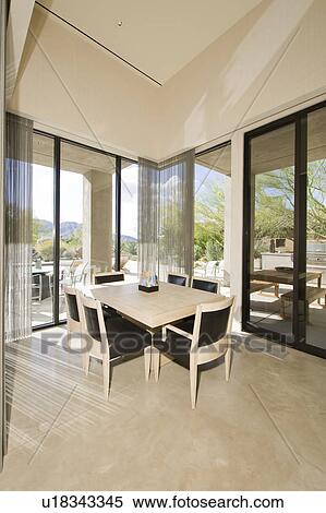Dining table by window View Large Photo Image Stock Photography - Dining table by window. Fotosearch