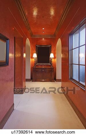 Empty red hallway with dresser and window View Large Photo Image Picture - Empty red hallway with dresser and window. Fotosearch