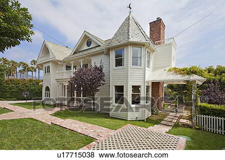 Stock Photo - Façade of traditional stylish house. Fotosearch