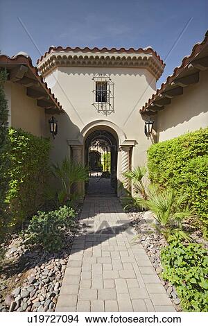 Garden path leading to residential front gate View Large Photo Image Picture - Garden path leading to residential front gate. Fotosearch