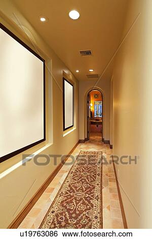 Stock Photograph - Hallway in luxurious house. Fotosearch