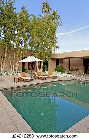 House exterior with pool View Large Photo Image Stock Image - House exterior with pool. Fotosearch