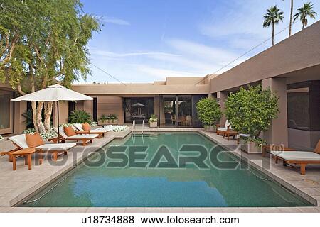 House exterior with pool View Large Photo Image Stock Photo - House exterior with pool. Fotosearch