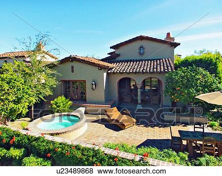 House exterior with spa and patio View Large Photo Image Stock Photo - House exterior with spa and patio. Fotosearch