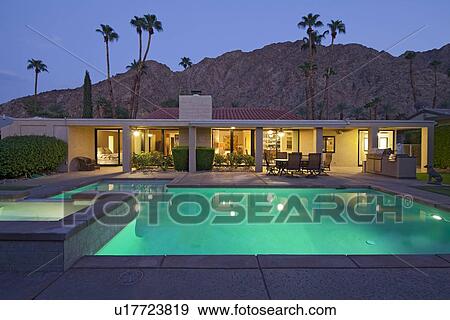 Stock Photo - House Exterior with swimming pool. Fotosearch