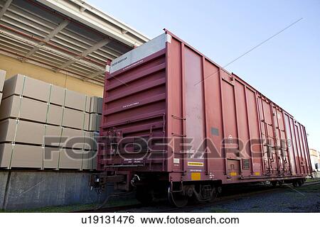 Industrial railway carriage transporting Lumber by rail View Large Photo Image Stock Photograph - Industrial railway carriage transporting Lumber by rail. Fotosearch