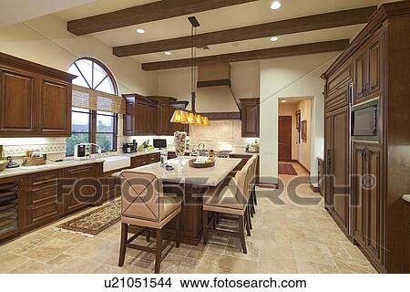 Large kitchen with breakfast bar View Large Photo Image Picture - Large kitchen with breakfast bar. Fotosearch