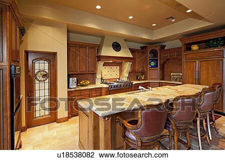 Large kitchen with breakfast bar View Large Photo Image Stock Image - Large kitchen with breakfast bar. Fotosearch