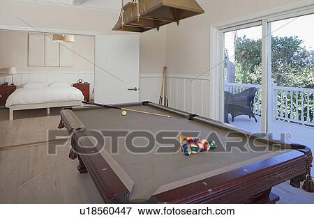 Living room with billiard table View Large Photo Image Stock Photo - Living room with billiard table . Fotosearch