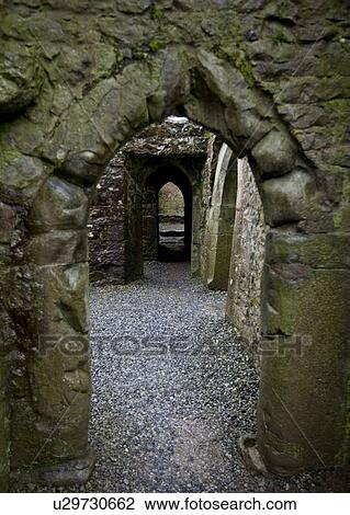 Stock Image - Looking through doorway in Quin Abbey, Ireland. Fotosearch