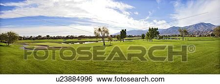 Stock Photograph - Panorama of golf course. Fotosearch