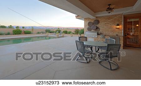 Patio and barbecue area with view to pool View Large Photo Image Stock Image - Patio and barbecue area with view to pool. Fotosearch