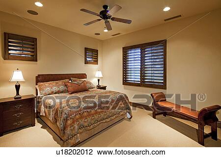 Stock Image - Small bedroom interior in luxury house. Fotosearch