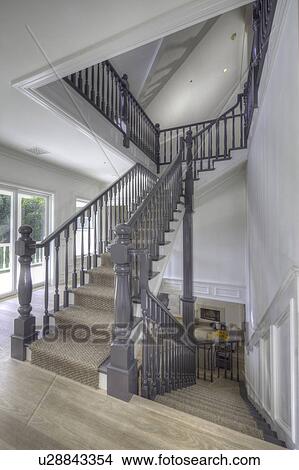 Staircase landing of traditional house View Large Photo Image Picture - Staircase landing of traditional house. Fotosearch