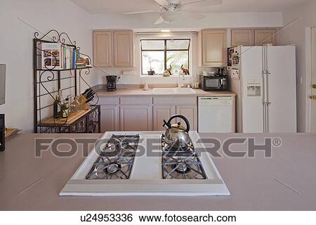 Stove Top And Kitchen Bench In Traditional Kitchen Stock