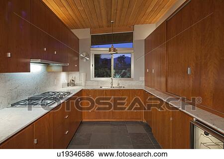 Timber interior of small residential kitchen View Large Photo Image Stock Photograph - Timber interior of small residential kitchen. Fotosearch