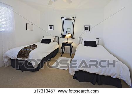 Stock Photo - Twin single room in luxury home. Fotosearch
