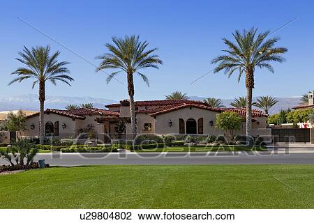 View across grass to façade of luxury suburban villa View Large Photo Image Stock Image - View across grass to façade of luxury suburban villa. Fotosearch