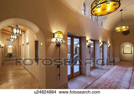 Picture - View down perpendicular hallways in Luxurious house. Fotosearch