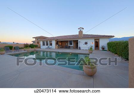 View of pool and bungalow exterior View Large Photo Image Picture - View of pool and bungalow exterior. Fotosearch