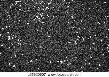 Wet black gravel with some white pebbles View Large Photo Image Stock Photo - Wet black gravel with some white pebbles. Fotosearch