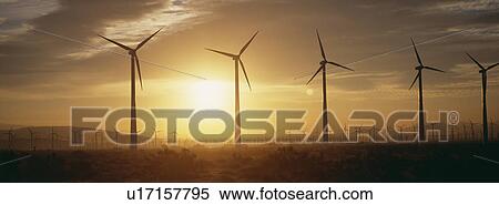 Stock Photography - Wind farm turbines at dawn. Fotosearch