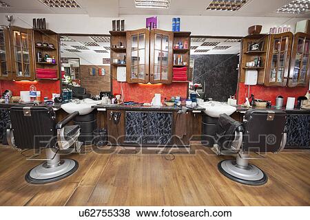 Chairs and wall mirrors in salon View Large Photo Image Stock Photo - Chairs and wall mirrors in salon. Fotosearch