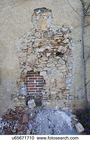 View of damaged stone wall View Large Photo Image Stock Image - View of damaged stone wall. Fotosearch