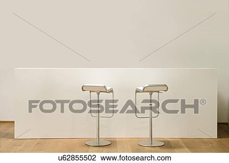 Barstools at counter in house View Large Photo Image Stock Image - Barstools at counter in house. Fotosearch