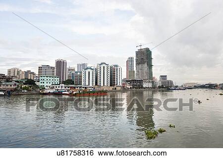 River Pasig with city skyline, Manila, Philippines View Large Photo Image Stock Photograph - River Pasig with city skyline, Manila, Philippines. Fotosearch