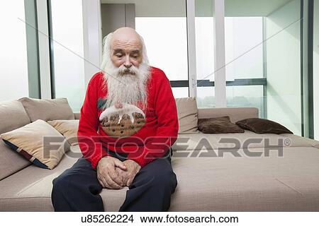 Sad pensive senior man sofa bed in living room View Large Photo Image Picture - Sad pensive senior man sofa bed in living room. Fotosearch
