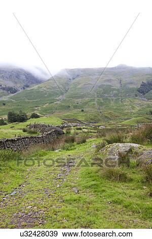 Stock Photo - View of landscape at countryside. Fotosearch