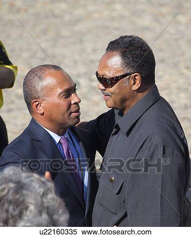 Stock Photography - Governor Deval Patrick meets Reverend Jesse Jackson at the National Action to Realize the Dream march and rally commemorating the 50th Anniversary of the march on Washington, D. C.. Fotosearch