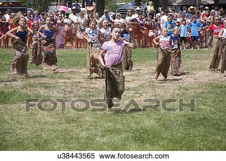 July 4, Indpendence Day, kids compete in Three Legged race in Ouray, Colorado View Large Photo Image Stock Photography - July 4, Indpendence Day, kids compete in Three Legged race in Ouray, Colorado. Fotosearch