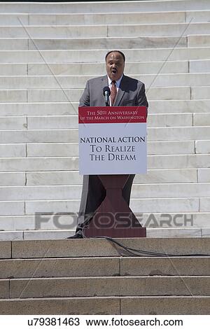 Stock Image - Martin Luther King III approaches podium at the National Action to Realize the Dream march and rally commemorating the 50th Anniversary of the march on Washington, D. C.. Fotosearch