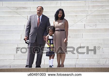 Stock Image - Martin Luther King III, wife and daughter at the National Action to Realize the Dream march and rally commemorating the 50th Anniversary of the march on Washington, D. C.. Fotosearch