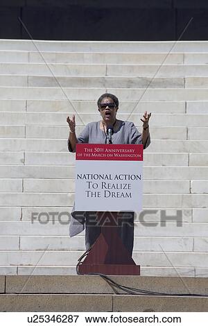 Stock Photo - Mrs. Medgar Wily Evers speaks at the National Action to Realize the Dream march and rally commemorating the 50th Anniversary of the march on Washington, D. C.. Fotosearch