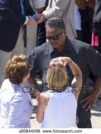 Nancy Pelosi and Mrs. Steny Hoyer meet with Reverend Jesse Jackson at the National Action to Realize the Dream march and rally commemorating the 50th Anniversary of the march on Washington, D. C. View Large Photo Image Stock Photo - Nancy Pelosi and Mrs. Steny Hoyer meet with Reverend Jesse Jackson at the National Action to Realize the Dream march and rally commemorating the 50th Anniversary of the march on Washington, D. C.. Fotosearch
