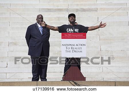 Stock Photograph - Philip Agnew speaks at the National Action to Realize the Dream march and rally commemorating the 50th Anniversary of the march on Washington, D. C.. Fotosearch