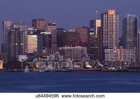Stock Photograph - Scenic San Diego skyline, sailboat and waterfront, Pacific Ocean at sunset, California. Fotosearch