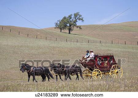 Stock Photo - Spirit of the West, a stage coachand horse-drawn vehicle reenactment in Santa Ynez, California. Fotosearch