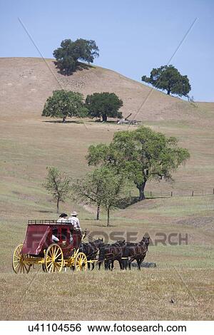 Stock Photograph - Spirit of the West, a stage coachand horse-drawn vehicle reenactment in Santa Ynez, California. Fotosearch