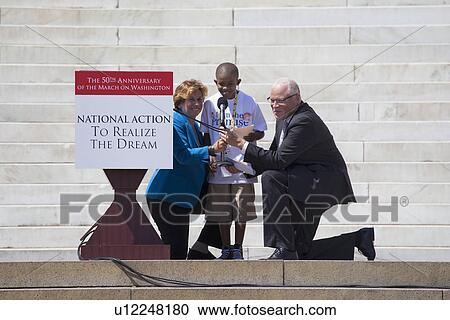 Student Activist Sean Johnson speaks at the National Action to Realize the Dream march and rally commemorating the 50th Anniversary of the march on Washington, D. C. View Large Photo Image Stock Image - Student Activist Sean Johnson speaks at the National Action to Realize the Dream march and rally commemorating the 50th Anniversary of the march on Washington, D. C.. Fotosearch